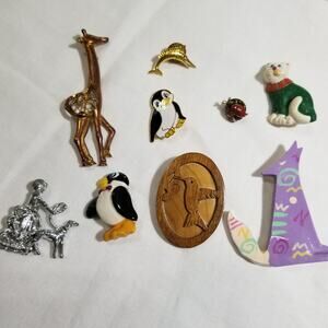 Nine animal pins